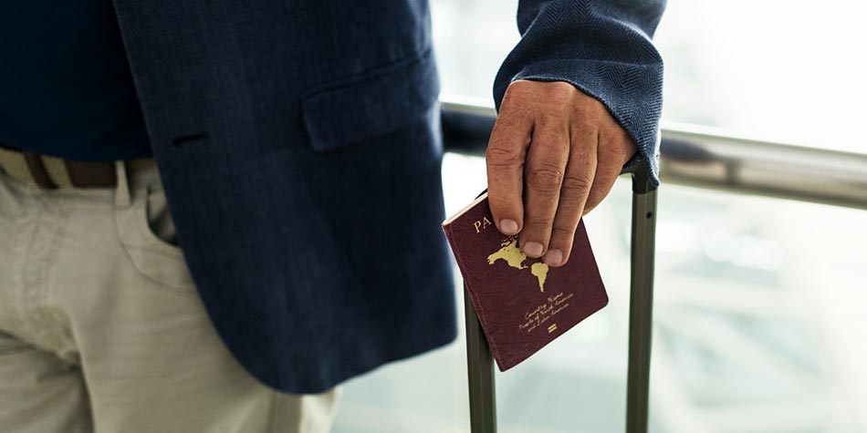 man with visa and passport